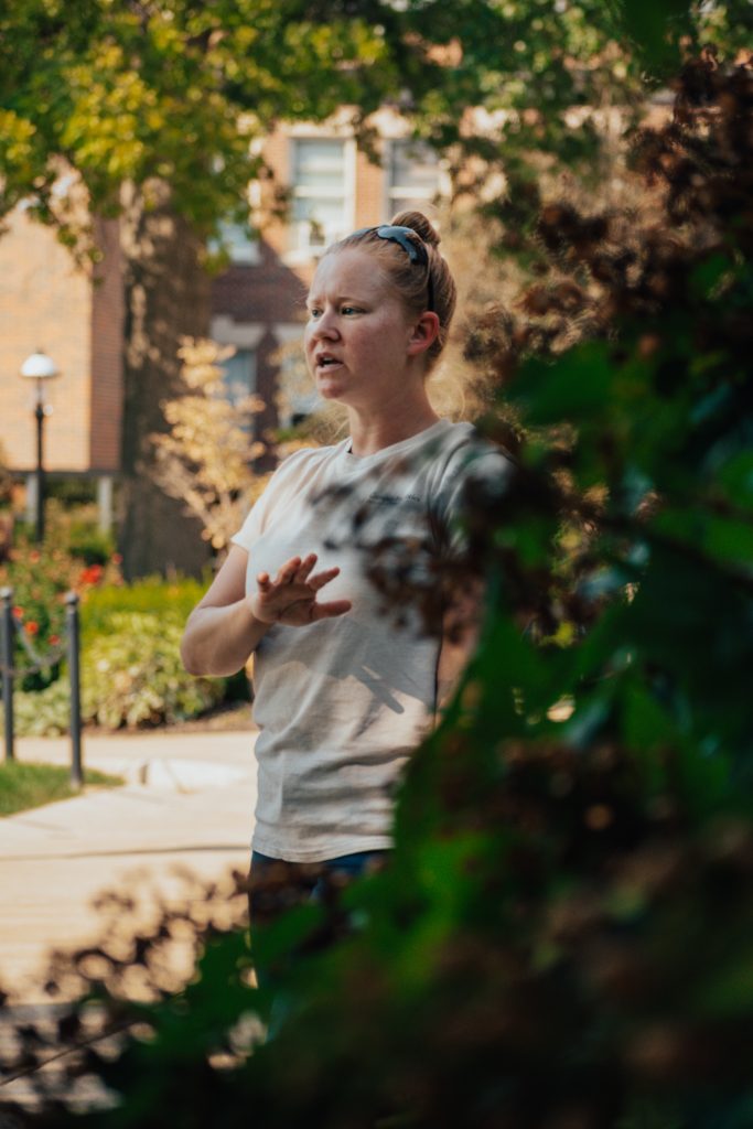 Horticulture Manager, Jenna Sommer, leads a group of students on a tour of the garden.
