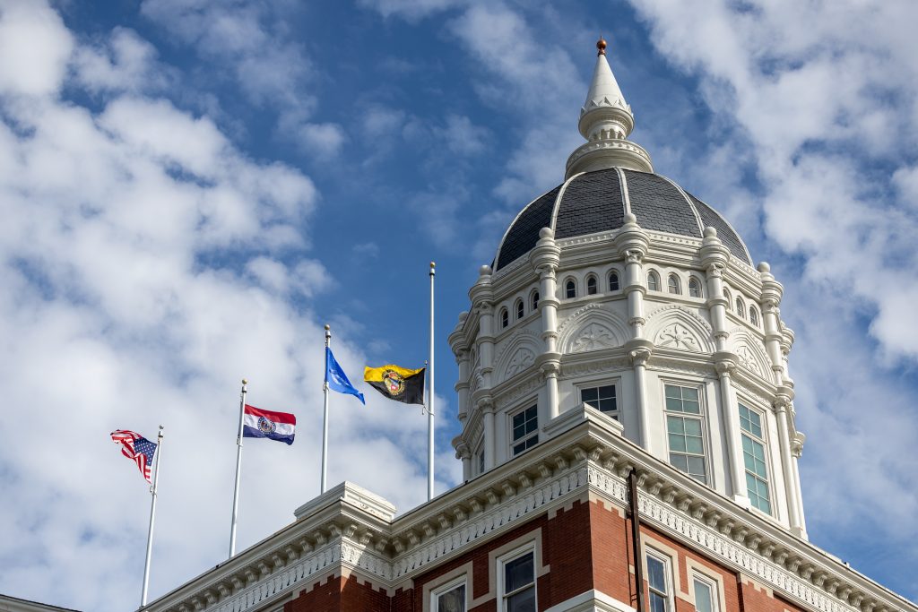 Flags on top of Jesse Hall