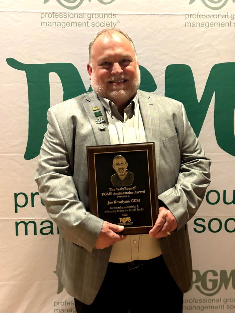 Joe Kovolyan with the Walter Bonvell Ambassador Award