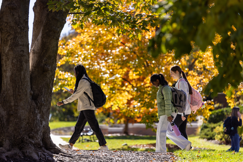 Students walking on sidewalk